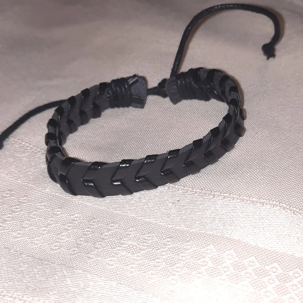 3 black bracelets